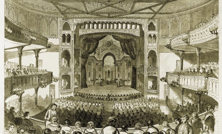 Brooklyn Academy of Music interior during a vibrant opening night concert with audience and stage lights.