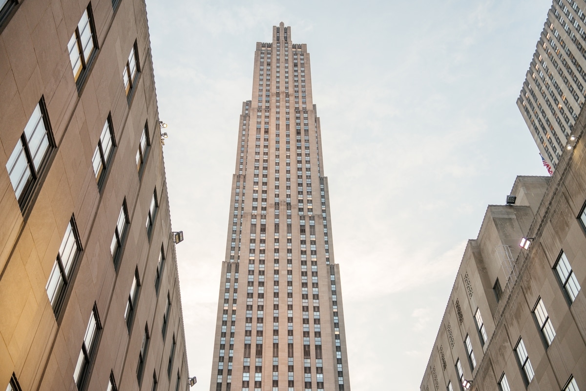 Striking view of Rockefeller Center tower framed by autumn skies and skyline in New York City